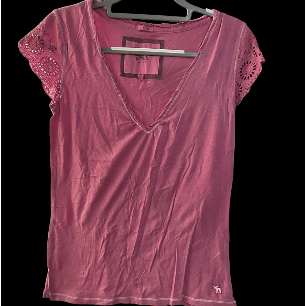 Abercrombie and Fitch because I do pink short sleeve